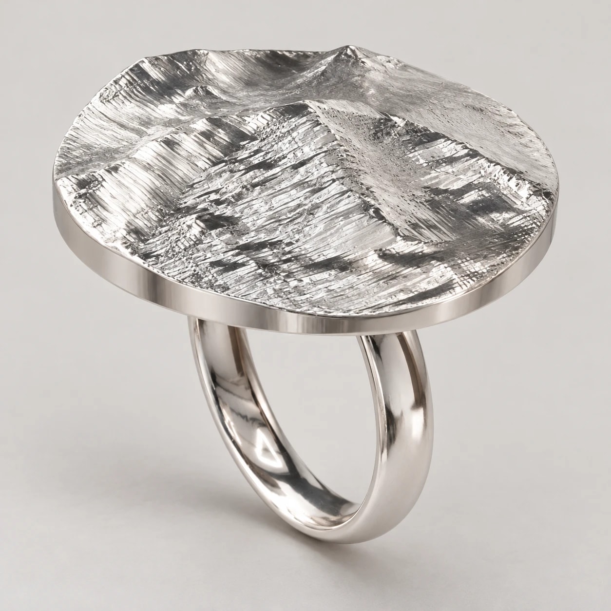 Statement Disc in polished sterling silver with Mount Assiniboine terrain relief